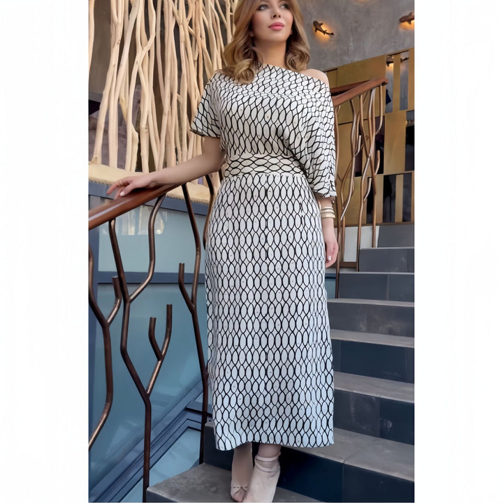 Damer Elegant Maxikjol med asymmetrisk skärning och strukturerat mönster Mirla-Eva Jonsson