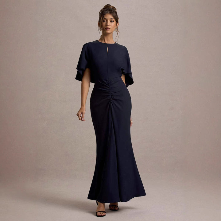 Damer Elegant Maxiklänning med Flödande Snitt och Dramatiska Ärmar Mirla-Eva Jonsson