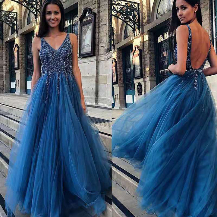Damer Elegant Maxiklänning med Glittrande Överdel och Hög Slits Mirla-Eva Jonsson