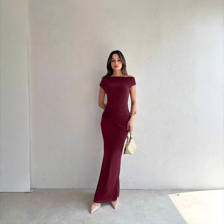 Damer Elegant Maxiklänning med Off-Shoulder Design och dekorativ drapering Mirla-Eva Jonsson