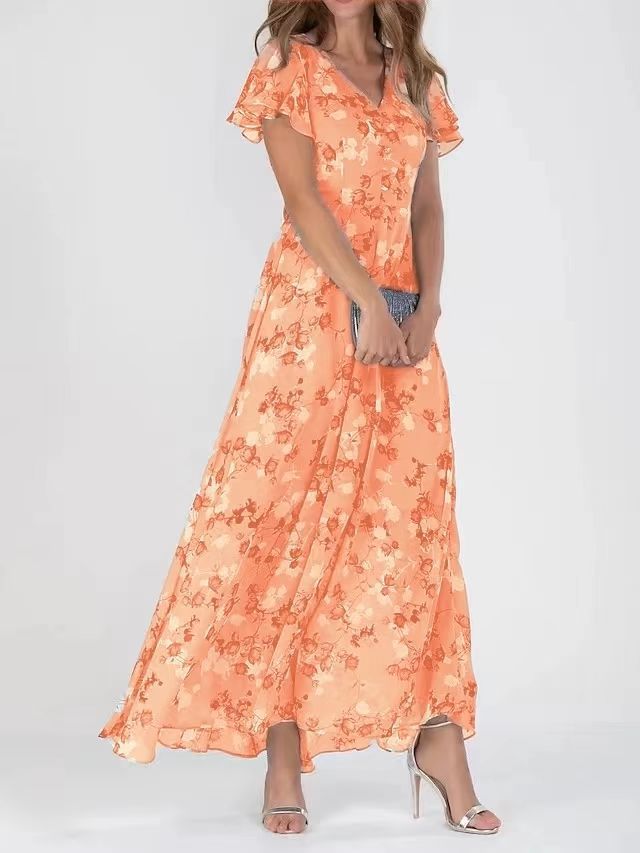 Damer Elegant Maxiklänning med Transparenta Ärmar och Blommönster Mirla-Eva Jonsson