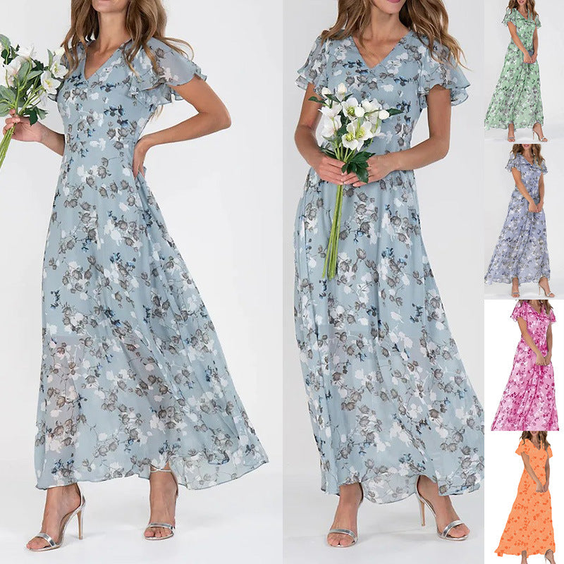Damer Elegant Maxiklänning med Transparenta Ärmar och Blommönster Mirla-Eva Jonsson