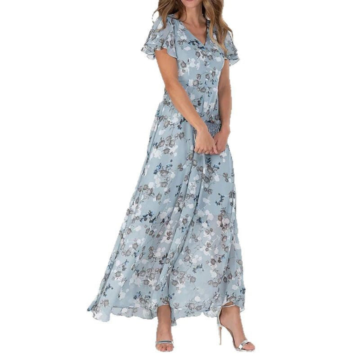 Damer Elegant Maxiklänning med Transparenta Ärmar och Blommönster Mirla-Eva Jonsson