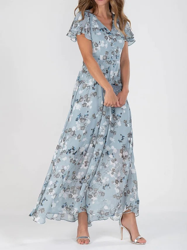Damer Elegant Maxiklänning med Transparenta Ärmar och Blommönster Mirla-Eva Jonsson