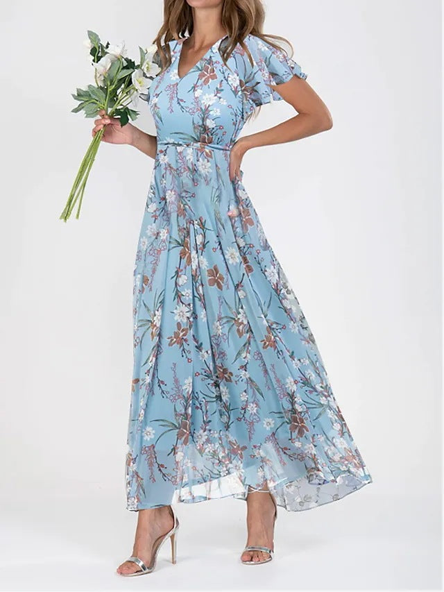 Damer Elegant Maxiklänning med Transparenta Ärmar och Blommönster Mirla-Eva Jonsson