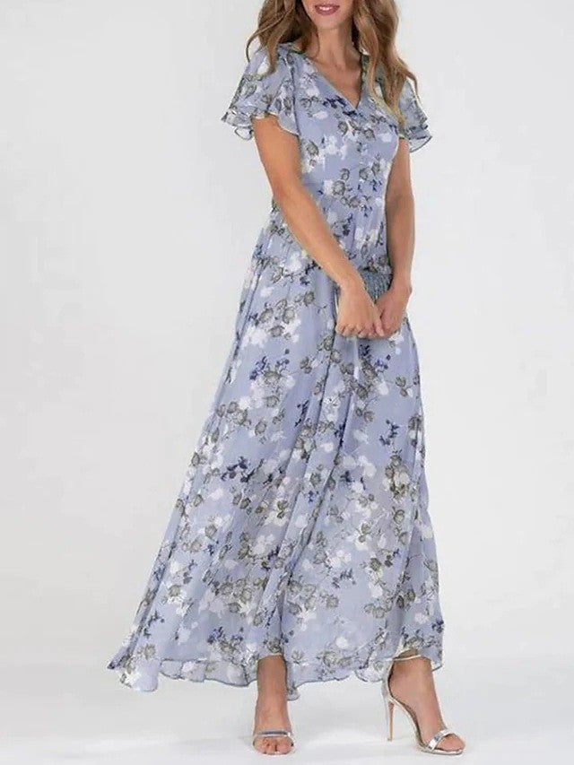 Damer Elegant Maxiklänning med Transparenta Ärmar och Blommönster Mirla-Eva Jonsson