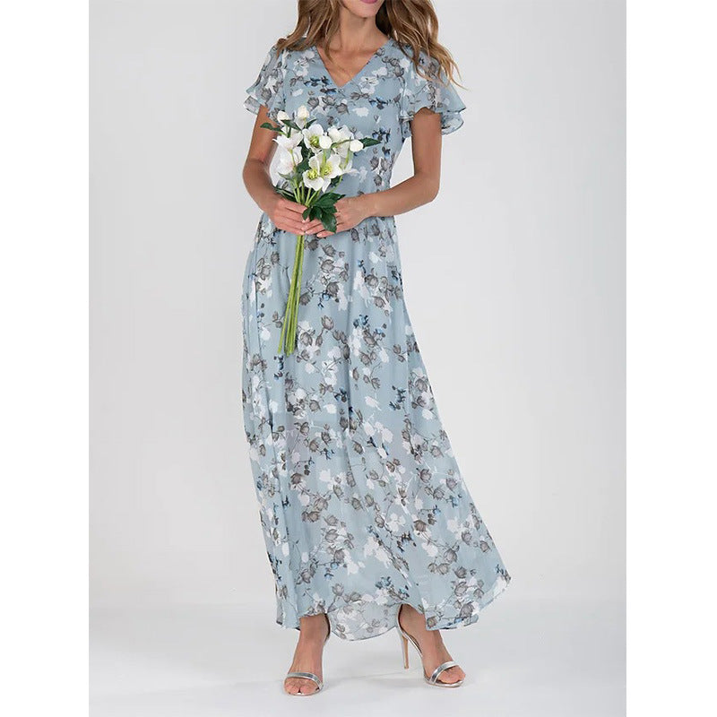Damer Elegant Maxiklänning med Transparenta Ärmar och Blommönster Mirla-Eva Jonsson