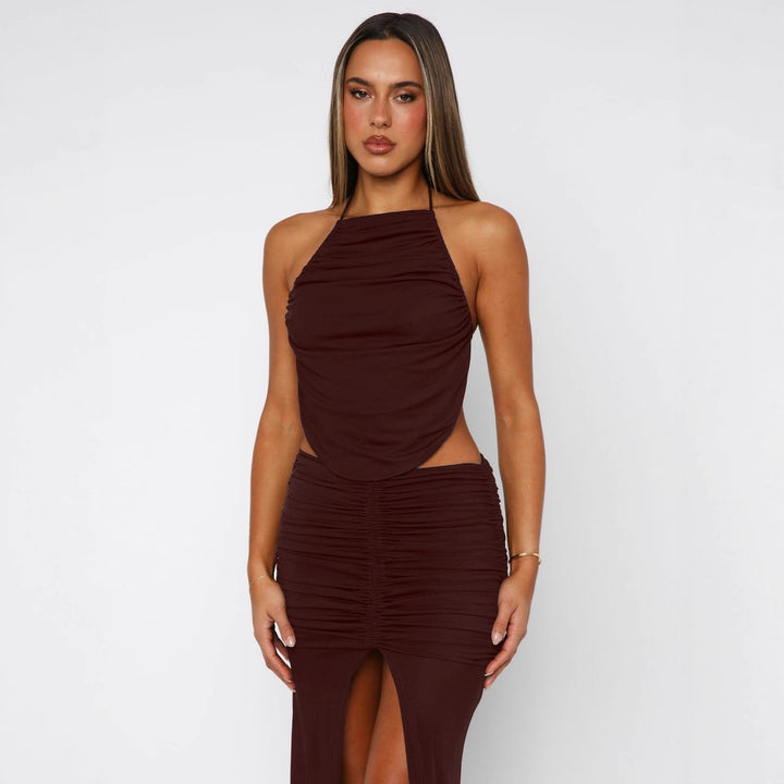 Damer Elegant Maxiklänning med asymmetrisk halterhals och utstickande slits Mirla-Eva Jonsson