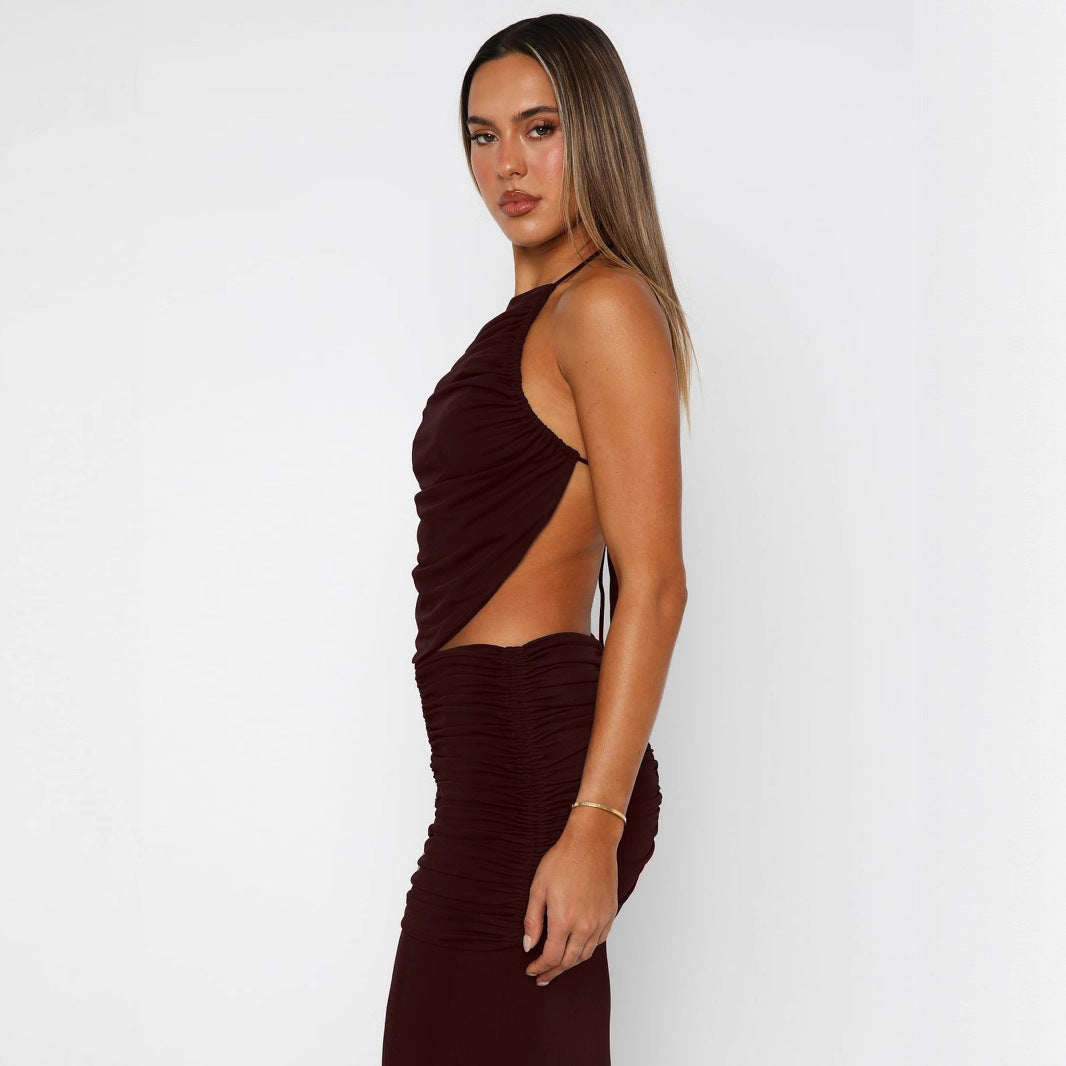 Damer Elegant Maxiklänning med asymmetrisk halterhals och utstickande slits Mirla-Eva Jonsson