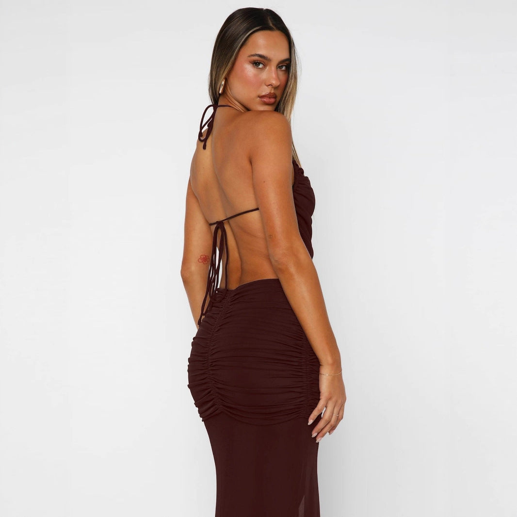 Damer Elegant Maxiklänning med asymmetrisk halterhals och utstickande slits Mirla-Eva Jonsson
