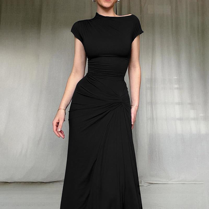 Damer Elegant Maxiklänning med asymmetrisk skärning och dekorerad drapering Mirla-Eva Jonsson
