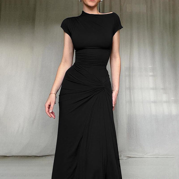 Damer Elegant Maxiklänning med asymmetrisk skärning och dekorerad drapering Mirla-Eva Jonsson