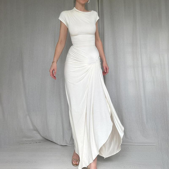 Damer Elegant Maxiklänning med asymmetrisk skärning och dekorerad drapering Mirla-Eva Jonsson