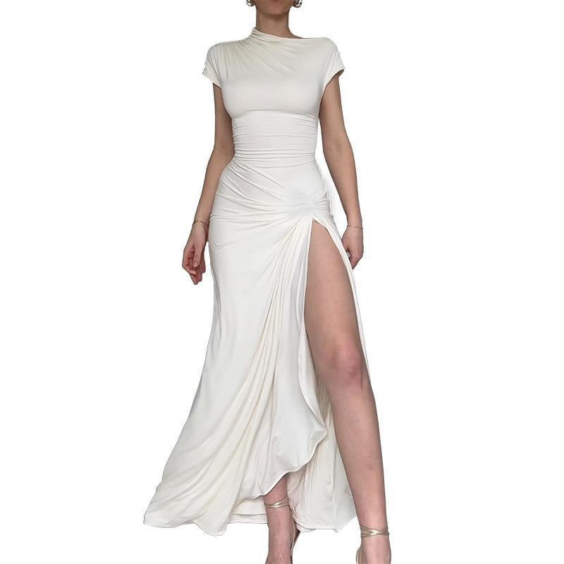 Damer Elegant Maxiklänning med asymmetrisk skärning och dekorerad drapering Mirla-Eva Jonsson