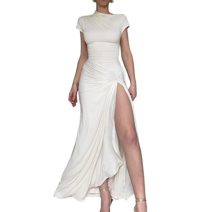 Damer Elegant Maxiklänning med asymmetrisk skärning och dekorerad drapering Mirla-Eva Jonsson
