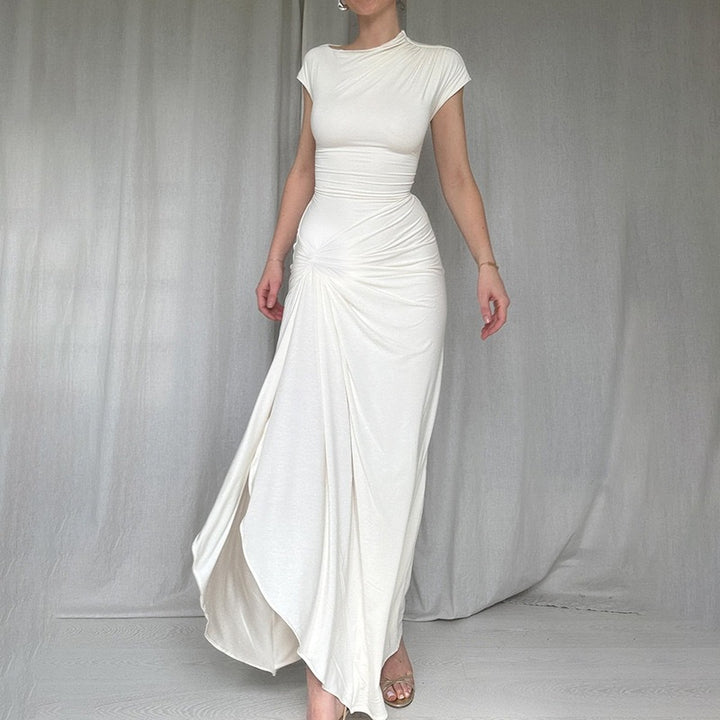 Damer Elegant Maxiklänning med asymmetrisk skärning och dekorerad drapering Mirla-Eva Jonsson