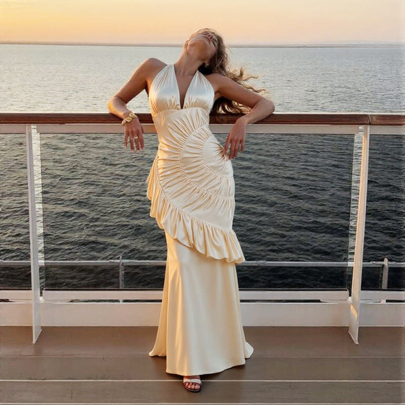 Damer Elegant Maxiklänning med asymmetrisk skärning och raffinerade draperingar Mirla-Eva Jonsson