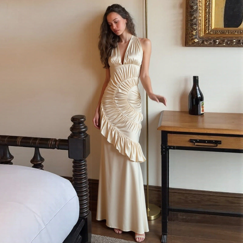 Damer Elegant Maxiklänning med asymmetrisk skärning och raffinerade draperingar Mirla-Eva Jonsson