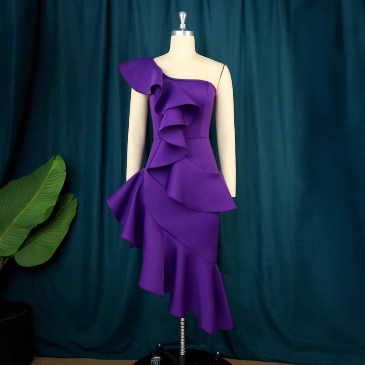 Damer Elegant Maxiklänning med asymmetrisk volangdesign Mirla-Eva Jonsson