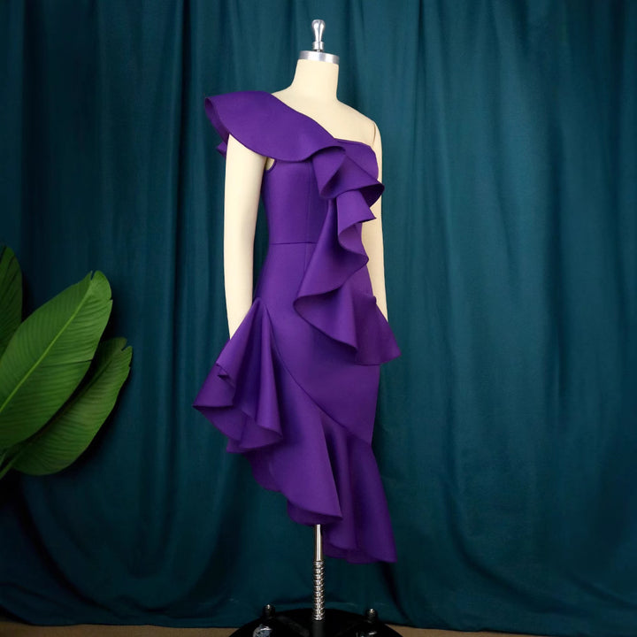 Damer Elegant Maxiklänning med asymmetrisk volangdesign Mirla-Eva Jonsson