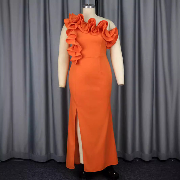 Damer Elegant Maxiklänning med asymmetriska volanger och slits Mirla-Eva Jonsson