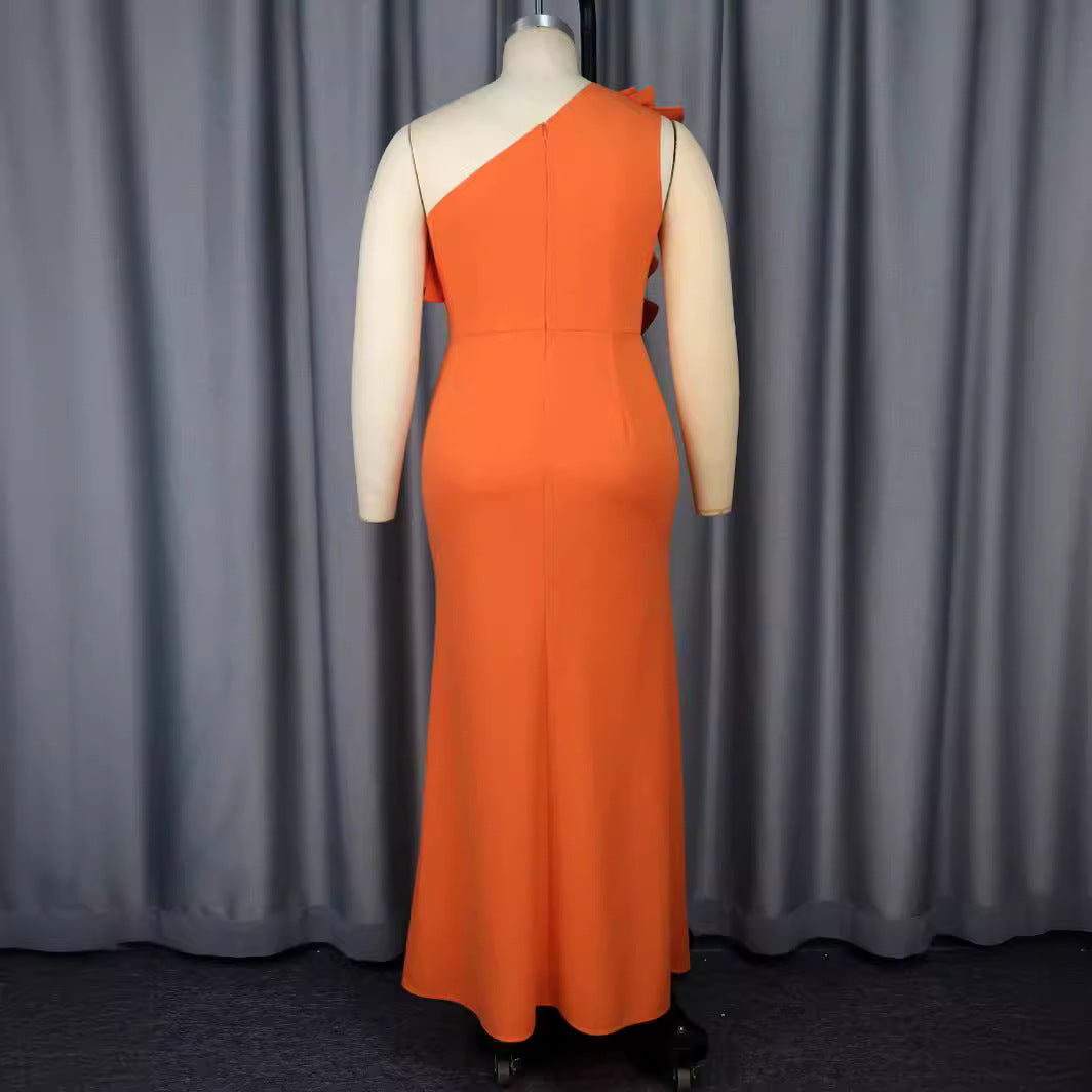 Damer Elegant Maxiklänning med asymmetriska volanger och slits Mirla-Eva Jonsson