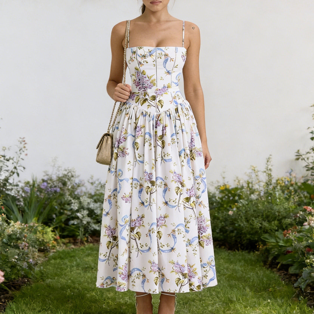 Damer Elegant Maxiklänning med blommönster och avskuret design Mirla-Eva Jonsson