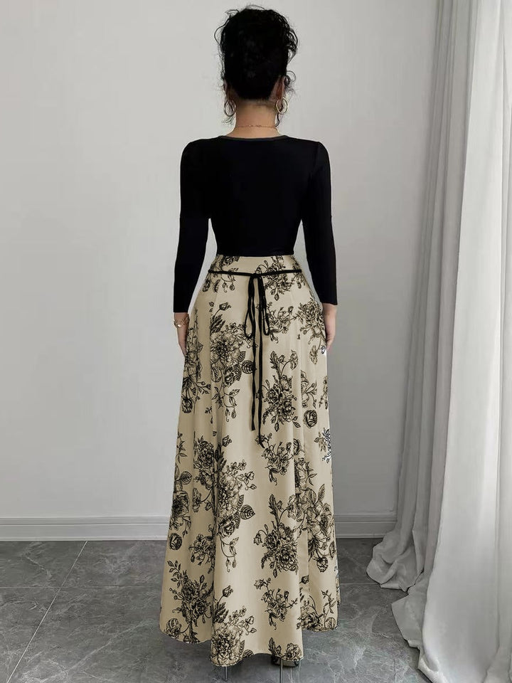 Damer Elegant Maxiklänning med blommönster och figursydd passform Mirla-Eva Jonsson