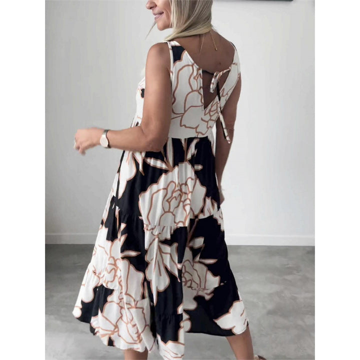 Damer Elegant Maxiklänning med blommönster och flödande kjol Mirla-Eva Jonsson