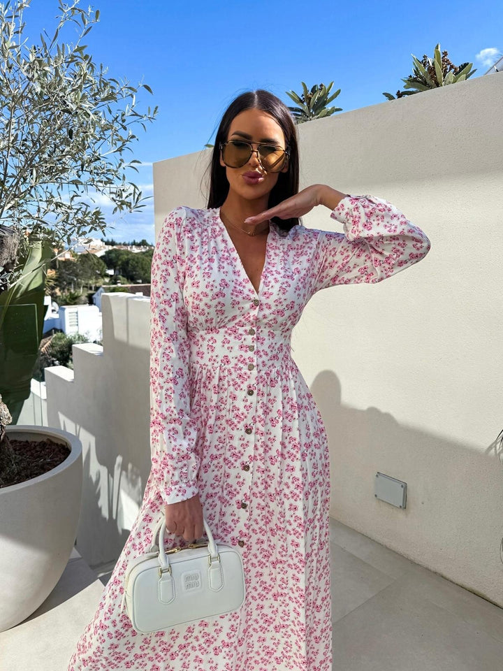 Damer Elegant Maxiklänning med blommönster och knappdetaljer Eva Jonsson-Eva Jonsson