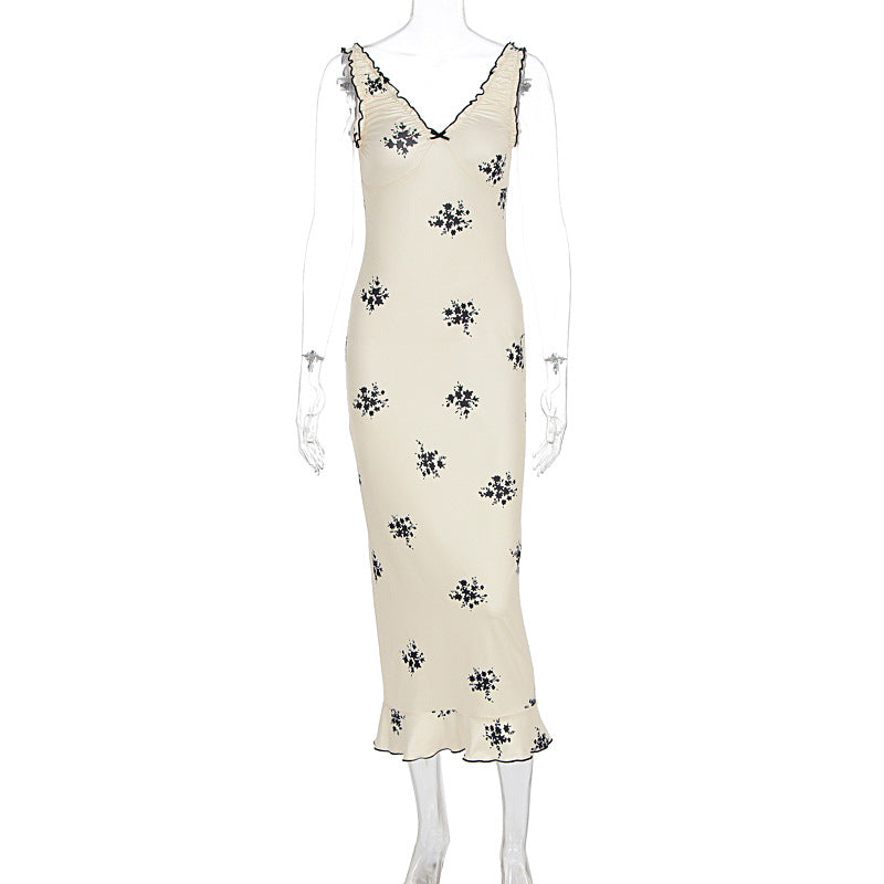 Damer Elegant Maxiklänning med blommönster och volanger Mirla-Eva Jonsson