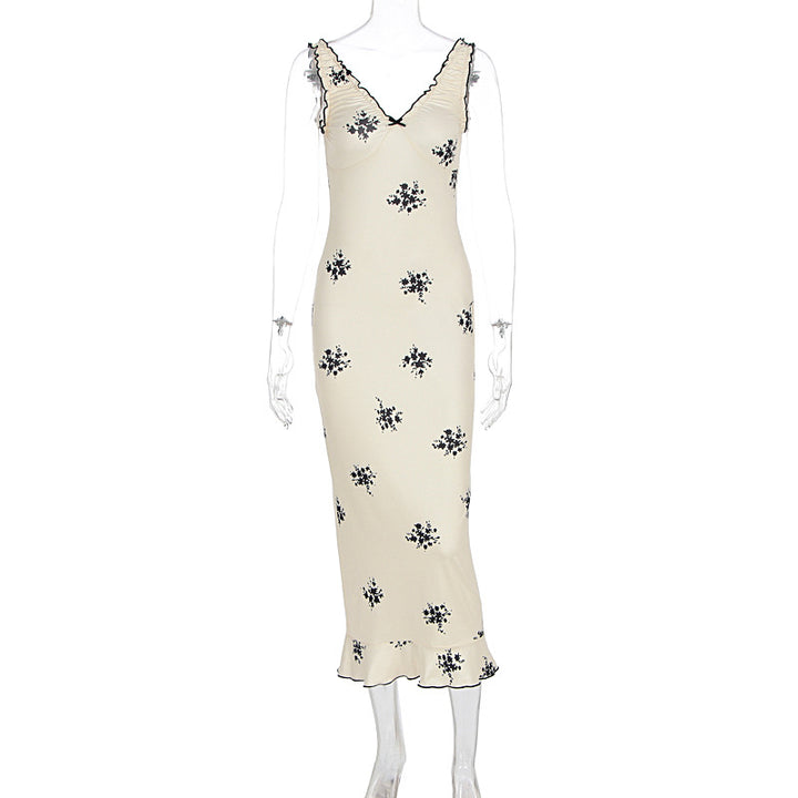 Damer Elegant Maxiklänning med blommönster och volanger Mirla-Eva Jonsson