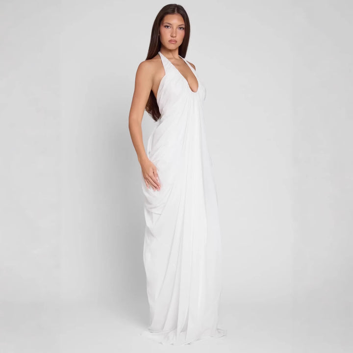 Damer Elegant Maxiklänning med djup V-ringning och flödande drapering Mirla-Eva Jonsson