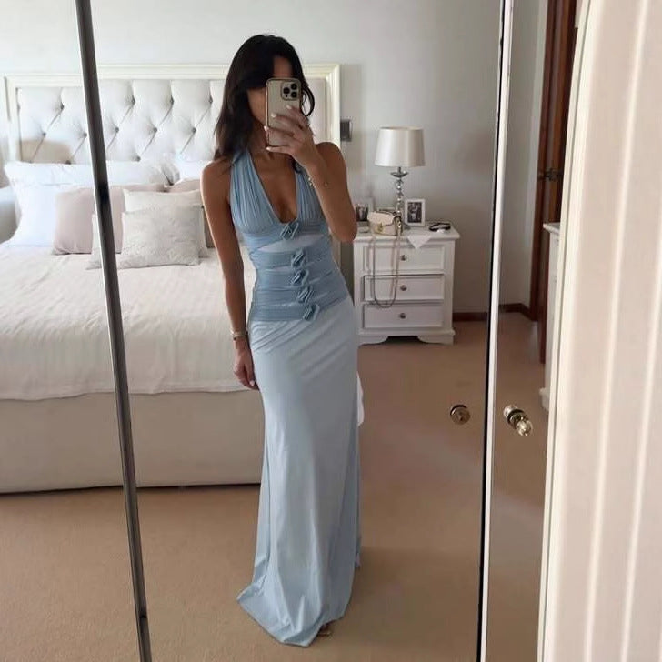 Damer Elegant Maxiklänning med djup V-ringning och svepdetaljer Mirla-Eva Jonsson