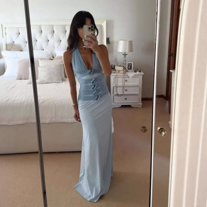 Damer Elegant Maxiklänning med djup V-ringning och svepdetaljer Mirla-Eva Jonsson