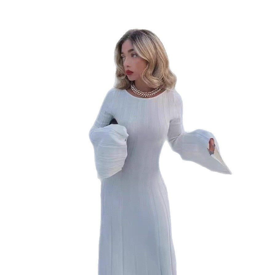 Damer Elegant Maxiklänning med djup ryggskärning och fint ribbdesign Mirla-Eva Jonsson