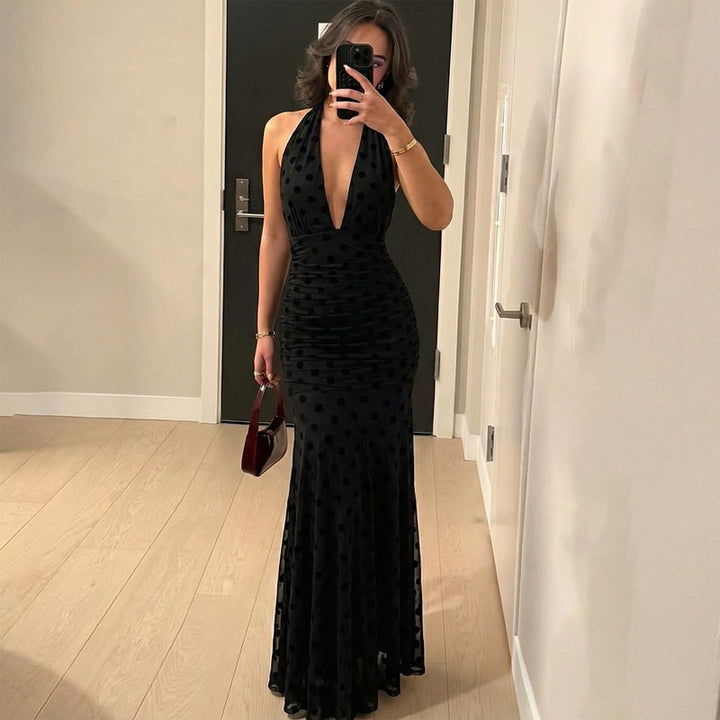 Damer Elegant Maxiklänning med djup urringning och voluminös kjol Mirla-Eva Jonsson