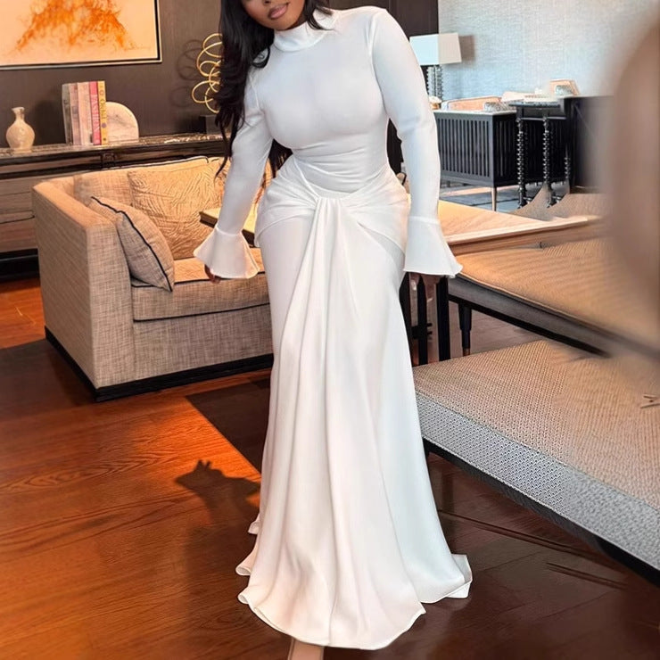 Damer Elegant Maxiklänning med figurnära snitt och volangdetaljer Mirla-Eva Jonsson
