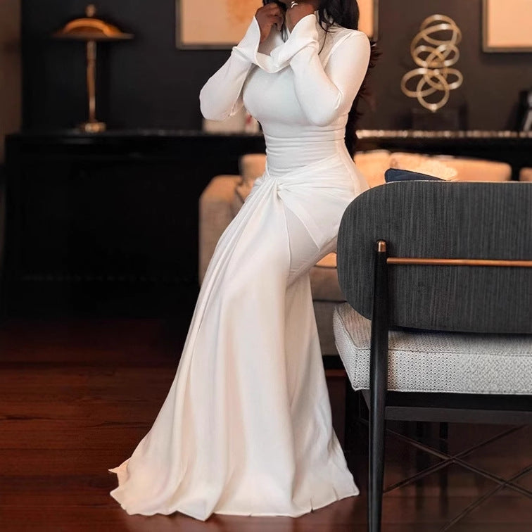 Damer Elegant Maxiklänning med figurnära snitt och volangdetaljer Mirla-Eva Jonsson