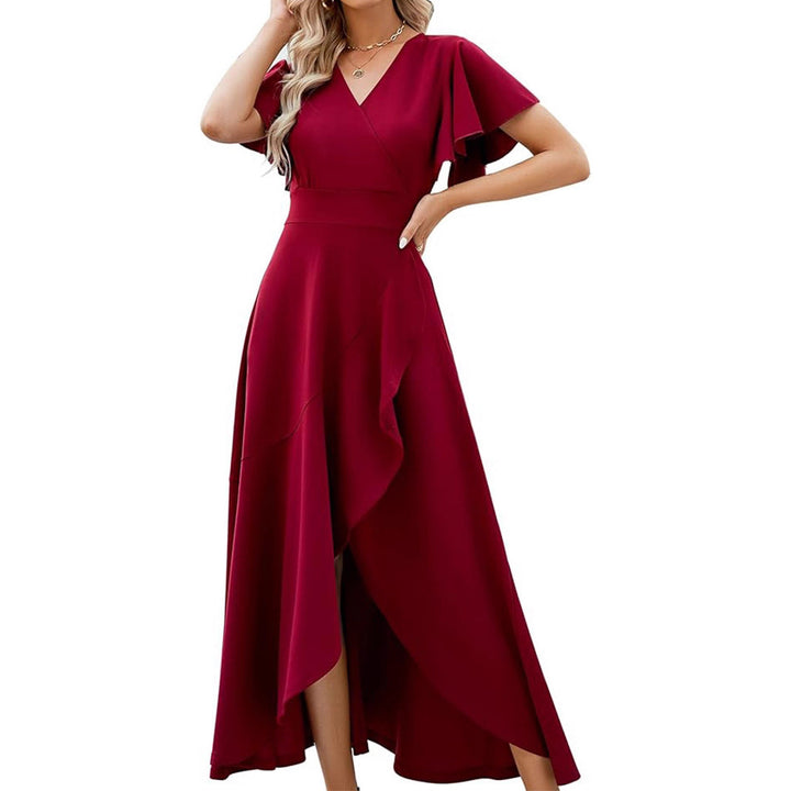 Damer Elegant Maxiklänning med flödande kjol och volangdetaljer Mirla-Eva Jonsson