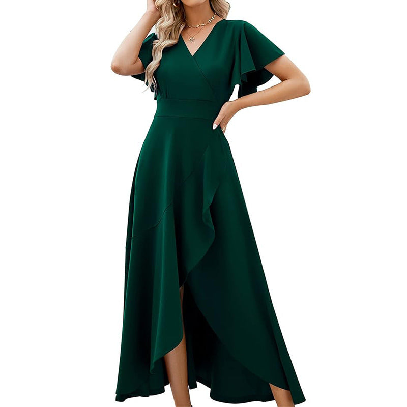 Damer Elegant Maxiklänning med flödande kjol och volangdetaljer Mirla-Eva Jonsson