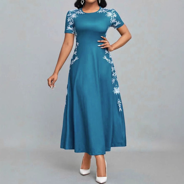 Damer Elegant Maxiklänning med florala broderier Mirla-Eva Jonsson