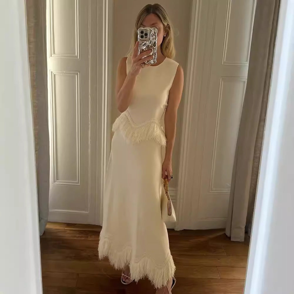 Damer Elegant Maxiklänning med fransdetalj och fin fåll Mirla-Eva Jonsson