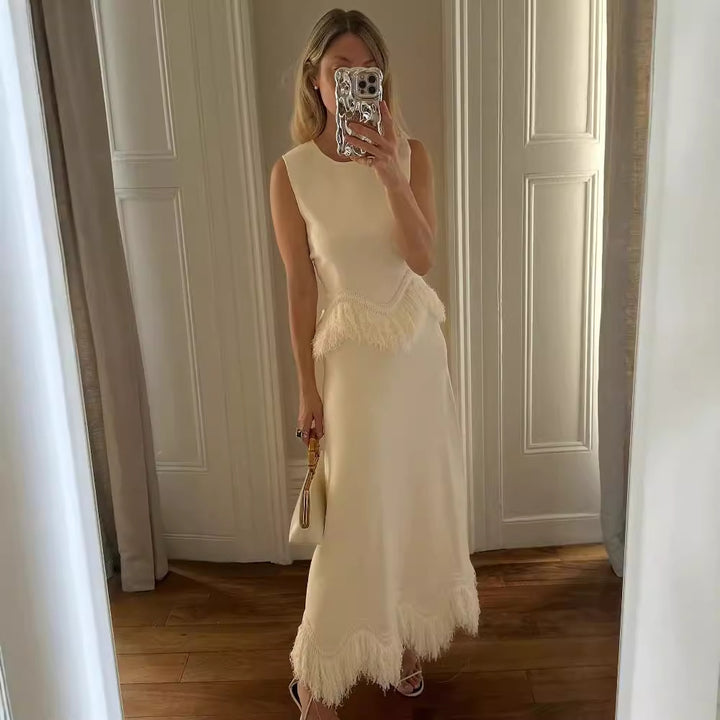 Damer Elegant Maxiklänning med fransdetalj och fin fåll Mirla-Eva Jonsson
