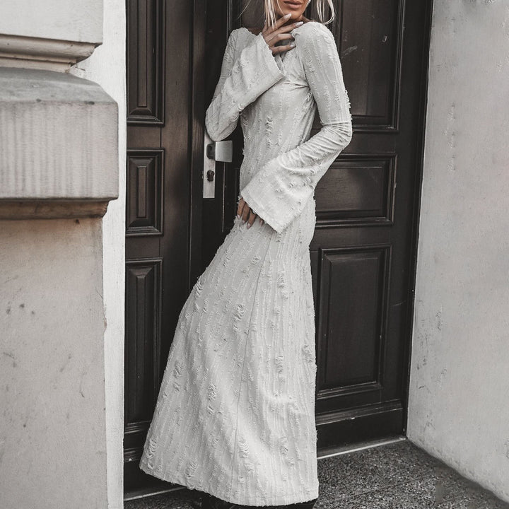 Damer Elegant Maxiklänning med iögonfallande ärmar och strukturerad design Mirla-Eva Jonsson