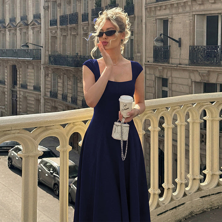 Damer Elegant Maxiklänning med kvadratisk halsringning och flödande kjol Mirla-Eva Jonsson