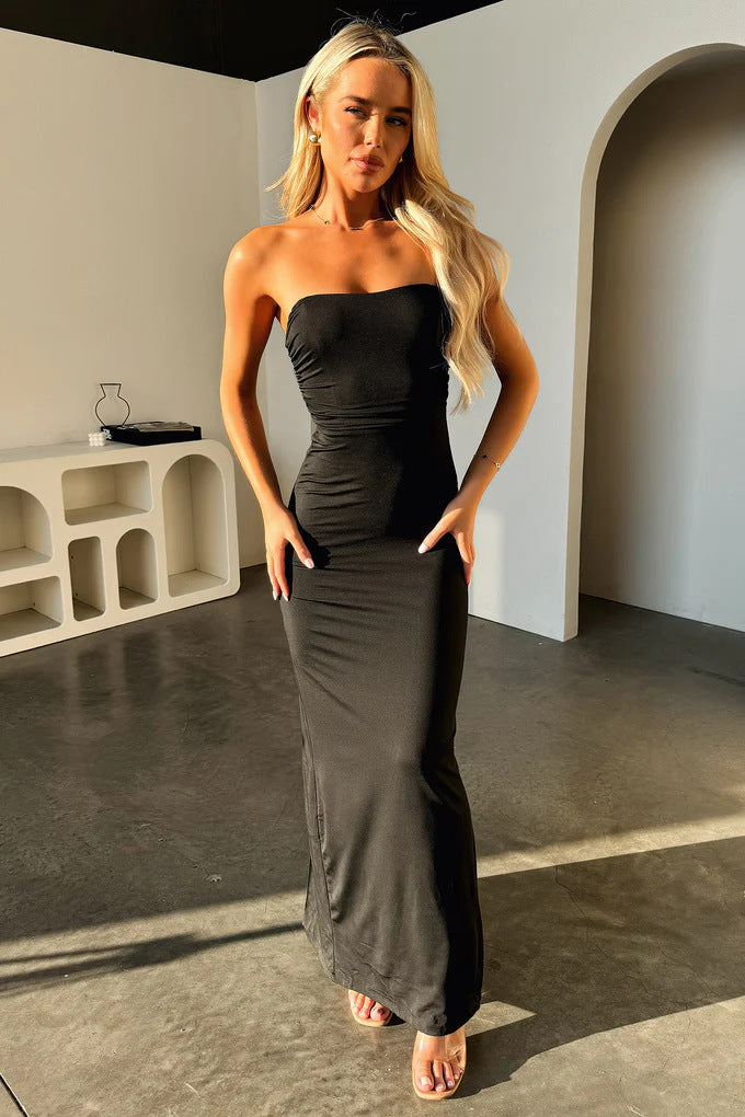 Damer Elegant Maxiklänning med off-shoulder design och figurnära snitt Mirla-Eva Jonsson