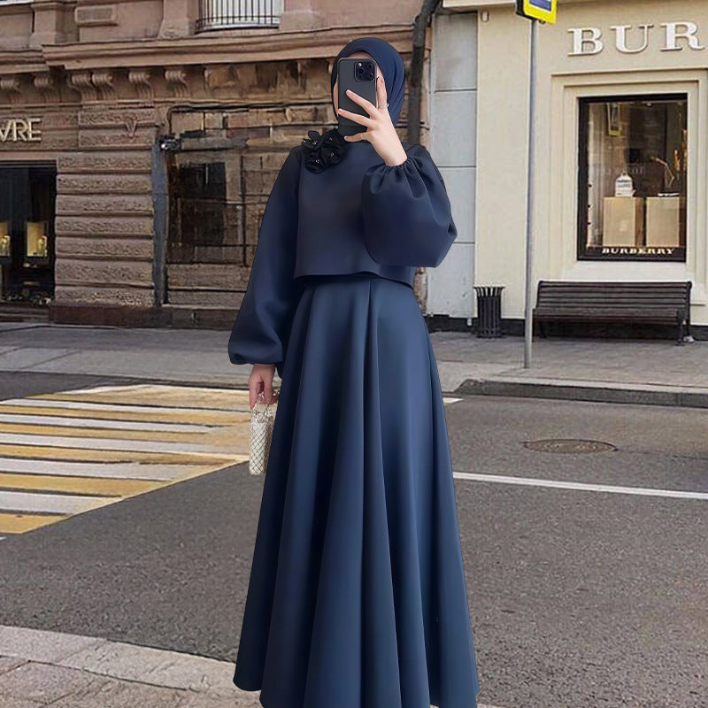 Damer Elegant Maxiklänning med puffärmar och dekorativ blomdetalj Mirla-Eva Jonsson