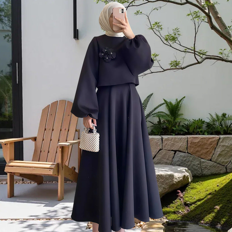 Damer Elegant Maxiklänning med puffärmar och dekorativ blomdetalj Mirla-Eva Jonsson