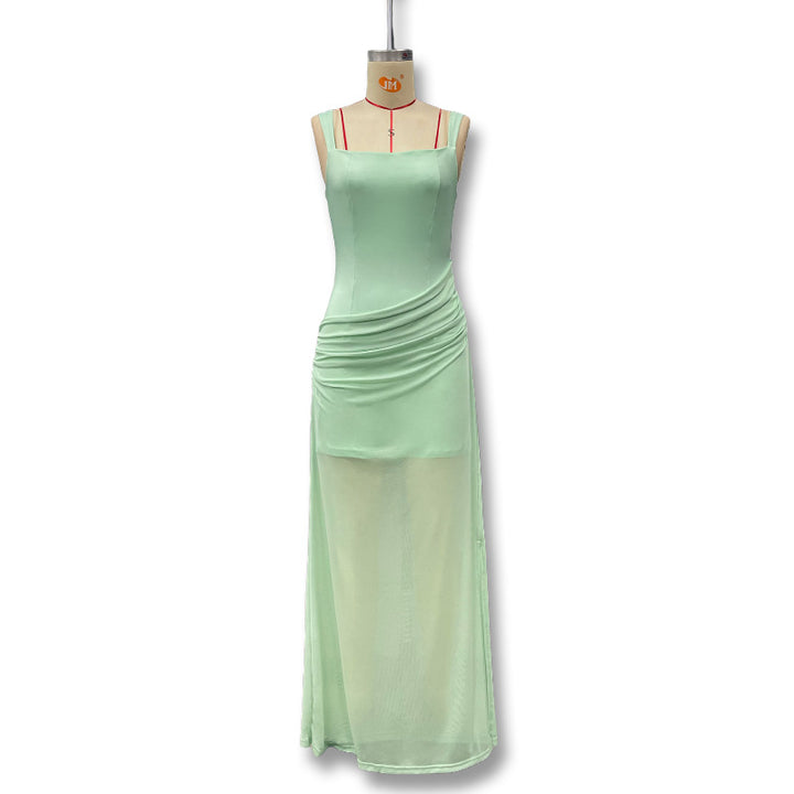 Damer Elegant Maxiklänning med raffinerade draperingar och genomskinlig kjol Mirla-Eva Jonsson